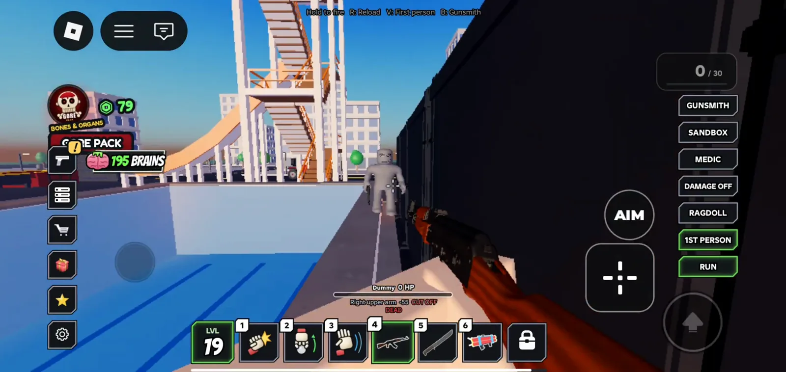 Ragdoll Reality mobile rifle view beside an empty blue pool shows a distant white scaffold tower without any eighty-stud label while the HUD lists B Gunsmith and an active Gunsmith sidebar button.